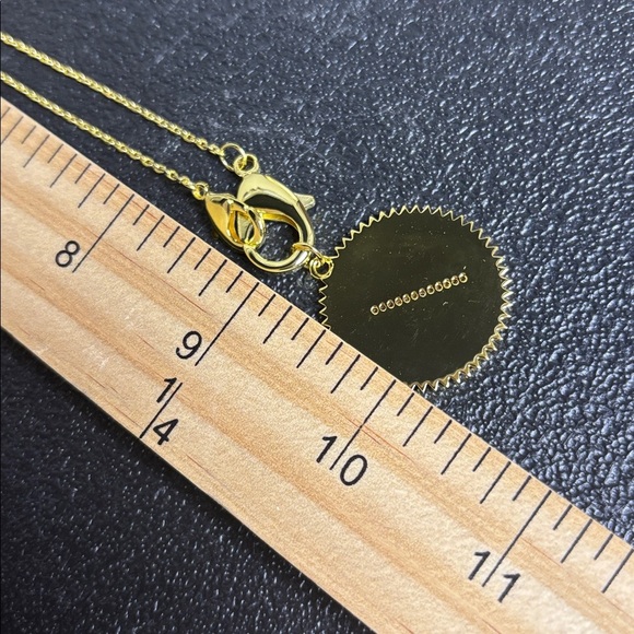 NWT Uncommon James Costa Necklace Gold Tone Pendant Necklace Cross Bow - Picture 9 of 10